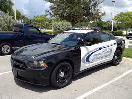 Black And White Police Car In 2012 The Cape Coral Police Department Began Its Transition To The 2013 Dodge Charger As Its Main Patrol Vehicle Police Cars Emergency Vehicles Dodge Charger