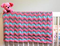The top and bottom edges of this afghan pattern are scalloped. Knitting Pattern For Classic Ripple Baby Afghan