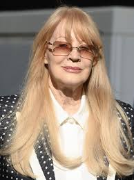 Reg Grundy will battle: widow and daughter settle TV king's $900m dispute