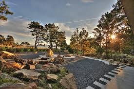 Just wanted a nice fire pit area where the grass wouldn't grow. Pea Gravel Patios Insteading