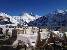 Enjoying The Sun On The Terrace Of Hotel Bergkristall Oberlech Austria Urlaub Im Schnee Urlaub Hotel