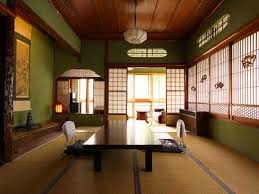 There is no loud music played in these rooms as the atmosphere should be in this image of a traditional japanese dining room, you can see how soft yellow and green are used throughout the room. Japanese Dining Room Whaciendobuenasmigas