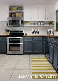 See how i raised our kitchen cabinets to the ceiling and added a floating shelf underneath to maximize storage space in our small kitchen. Impressive Hanging Shelves Under Kitchen Cabinets How To Raise Adding Shelves To Kitchen Cabinets Budget Kitchen Remodel Home Kitchens Kitchen Renovation