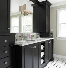 White modern kitchen cabinets offer black hardware along with gray backsplash, and dark wood floor. 14 Bathrooms With Gray Cabinets Ideas Bathroom Design Grey Bathroom Cabinets Bathroom Decor