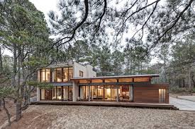 Maybe you would like to learn more about one of these? Contemporary Forest House With Curved Metal Roof