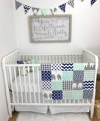 From monogrammed crib rail covers and cuddly security blankets to boys' crib sheets patterned with adorable animals and nautical sailboats, there's so much to love for your little one. Mint Gray Navy Elephant Baby Blanket Baby Boy Elephant Nursery Blue Nursery Boy Baby Boy Nursery Decor