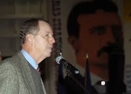U.S. Navy (retired) Rear Adm. Paul W. Parcells, first Commanding Officer of  the Nimitz Class Aircraft Carrier USS THEODORE ROOSEVELT (CVN 71), speaks  to current ROOSEVELT crewmembers and their guests during the