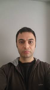 Thanks first. Can someone edit my picture and put a suit and white  background, because I need for visa documentation.