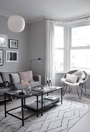 Take a cue from the eight decorating monochromatically with a neutral color — who doesn't love a gray room? My Soft Minimalist Living Room Makeover The Reveal These Four Walls Blog Living Room Grey Trendy Living Rooms Living Room Remodel
