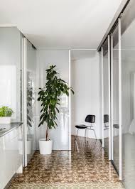 Architecture Studio Narch Has Renovated A Barcelona Apartment Removing Many Of The Internal Walls To Cr Apartment Interior Interior Tiles Condominium Interior