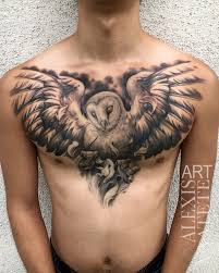 This butterfly really makes a statement as it covers up the client's old unwanted tattoos (a skeleton and a bird). Chest Tattoo Tom Woodcock Trueartists
