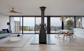 The home features a clever double scissor roof truss system that allows for vaulted ceilings in the living room, dining room, kitchen and two of the three bedrooms. Why You Should Consider Flipping Your Floorplan Modscape