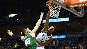 Youtu.be/cy1jn these 3 photos of jaylen brown dunking on giannis antetokounmpo are incredible. Giannis Antetokounmpo Has Tried So Hard To Dunk On Aron Baynes This Season And Finally He Did It Article Bardown