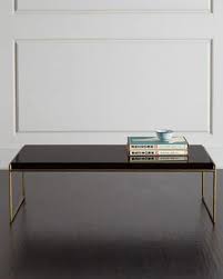 Juniper displays a sleek mink brown finish on all tables and ottoman bases. Interlude Black And Brass Juniper Coffee Table