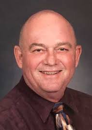 William J. Holcomb, of Fayetteville