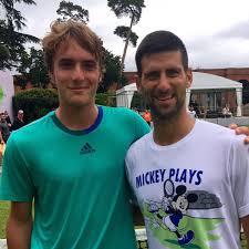 Novak djokovic poses with the mousquetaires cup after beating stefanos tsitsipas in the french open men's final. Good Luck To Both Novak Djokovic And Stefanos Tsitsipas In Madrid Today Tennis