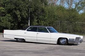Image result for White 1969 Cadillac
