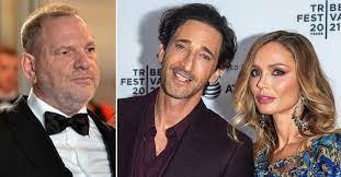 Producer harvey weinstein (l) and designer georgina chapman. Ocvuzbgcxnq58m