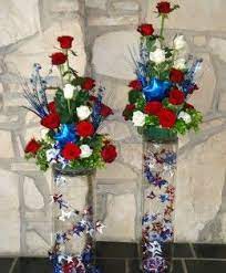 This wreath with its patriotic motif features clusters of red, white and blue rose blooms. 21 Fourth Of July Floral Arrangements Ideas Fourth Of July Floral Arrangements 4th Of July