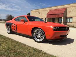 this dodge challenger was built by wisconsin s late model throttle and features an edelbrock e force superc dodge muscle cars dodge sports car dodge challenger this dodge challenger was built by