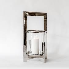 Set of three glass hurricane candles with metal bases for candles. Jana Aluminium And Glass Hurricane Lamp Hurricane Candle Holders Uk Retailfurnishing