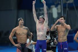 Dressel hopped up on the lane line, flexed his muscles and exhorted the crowd to cheer. Zbxt5eofdz L2m