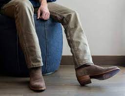 Wrangler cowboy cut jeans work best with boots as they have a little boot cut, levis are straight legged and won't lay over the boot as well. The Best Western Boots For Men