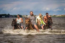 A group of teenagers from the wrong side of the tracks stumble upon a treasure map that unearths a long buried secret. Outer Banks Horseback Ride 2021