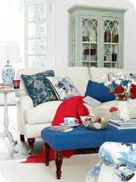 The sumptuous blue rather than looking cold against the white walls, creates a warm and inviting space to cosy up in. Patriotic Decor How To Do Red White And Blue Elegantly