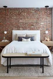 A Soho Loft With Exposed Brick And Subtle Color Touches The Nordroom Brick Wall Bedroom Exposed Brick Bedroom Industrial Bedroom Design