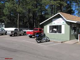 A saguaro cactus basking in a setting sun adorns the security. My Ride From Phoenix To Flagstaff Arizona Team Bhp