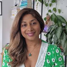 While folding a pile of shirts