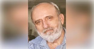 Obituary information for John "J.R." Ralph Wolf