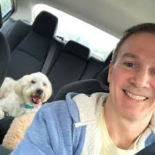 Baseball and softball teams play slow pitch softball