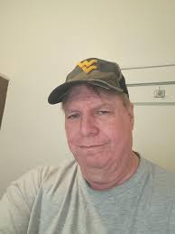 How did Coonskin Park escape destruction during the construction of I-77 in  1970?