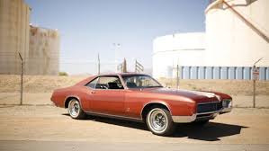 Image result for Riviera Red 1966 Buick