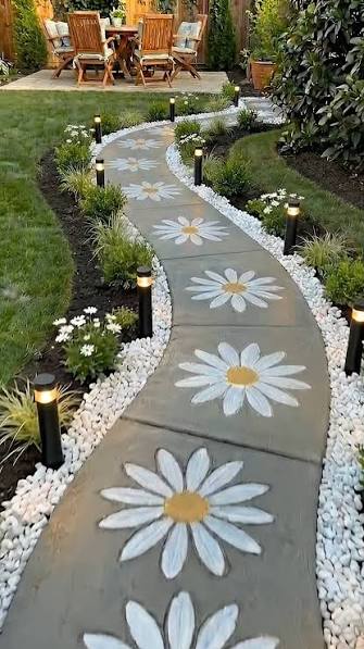Created a white daisy-shaped cement pathway with white pebbles, lined with  white daisies leading to my outdoor garden. &eth;&frac14;&acirc;&uml;