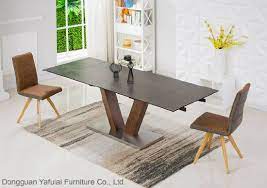 Warm up your dining room or kitchen décor with the natural oak finish of the east west furniture avon avpo7 seven piece extension dining table set. Ceramic Modern Extension Wood Steel Dining Table Furniture China Dining Table Dining Furniture Made In China Com