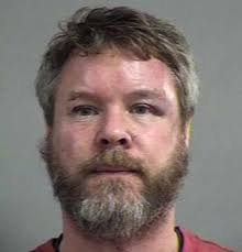 Man charged with assaulting police officers after accident