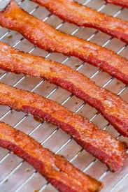 Thick cut means more bacon in fewer slices. How Long To Cook Bacon In The Oven Rack Or No Rack Tipbuzz