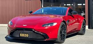 Image result for Divine Red 2021 Aston Martin