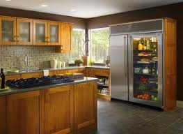 Look The Most Expensive Refrigerators Have One Feature In Common Glass Door Refrigerator Glass Door Fridge Home Kitchens