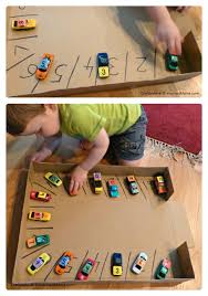 A Car Parking Numbers Game To Make Learning Numbers Fun Toddler Activities Activities For Kids Kids Learning