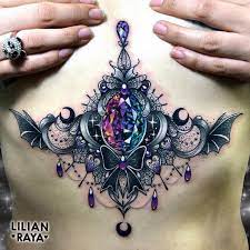 Underboobs Tattoo Ideas Golden Canvas Tattoo Art Studio Gem Tattoo Stomach Tattoos For Women Jewel Tattoo