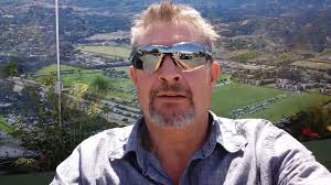 A McClain County deputy and his family escaped safely after their home and  vehicles were destroyed in an arson attack overnight. Investigators say  Austin Garrett Reeves, who was caught burglarizing the property