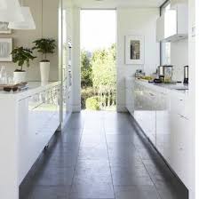 You can make a galley kitchen feel larger and more open by opting for white cabinets and bright paint on the walls. Galley Kitchen Design Ideas 16 Gorgeous Spaces Bob Vila