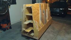 Compact unit with plenty storage space. Wood Storage Cart Monoloco Workshop