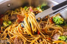 Hoisin sauce, soy sauce, brown sugar, ground ginger, minced garlic, beef broth, red pepper flakes, and black pepper. Beef Stir Fry With Noodles Favorite Family Recipes