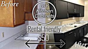 We currently have green granite countertops and custom white oak quarter sawn cabinets. Diy Modern Black Kitchen Cabinet Makeover Marble Counter Tops Affordable Rental Kitchen Upgrade Ezay Construction