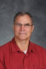 Davis settles to teach after years in engineering, business